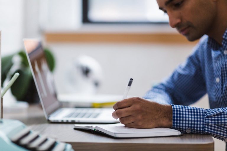 a man sitting at a desk