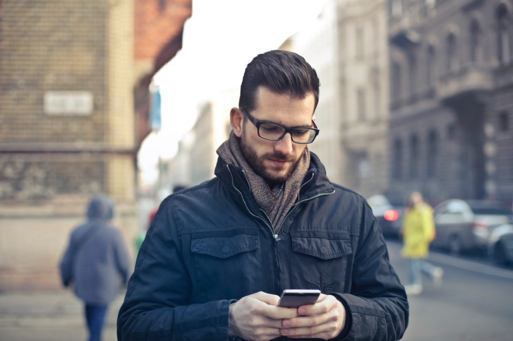 a man holding a phone