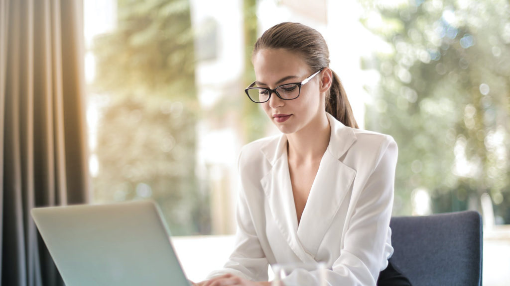 a woman working on a laptop