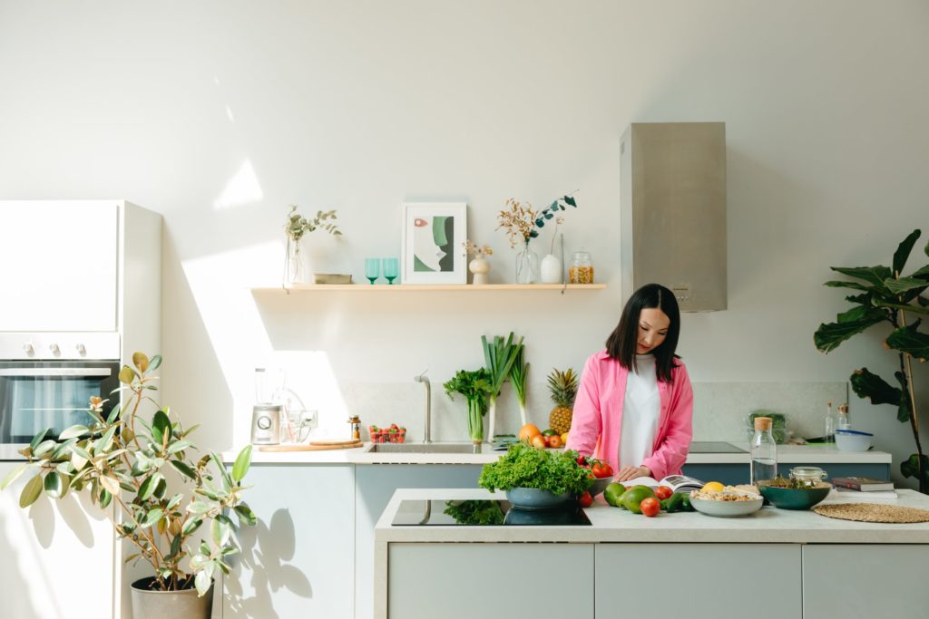 a person standing in a kitchen