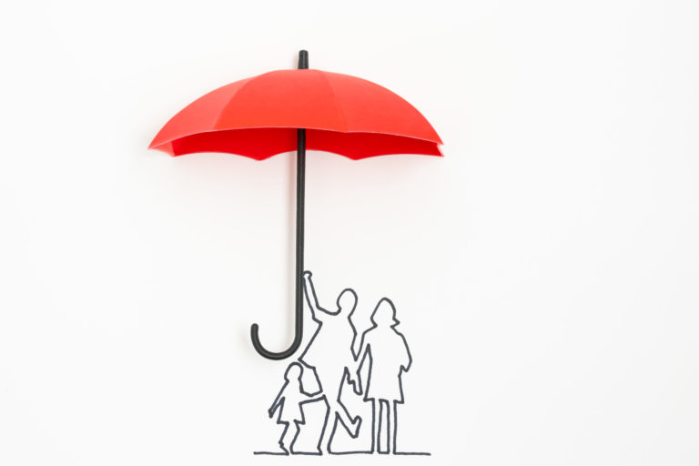 a red umbrella on a pole