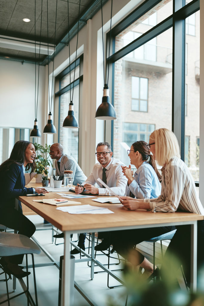 a group of people sitting at a table