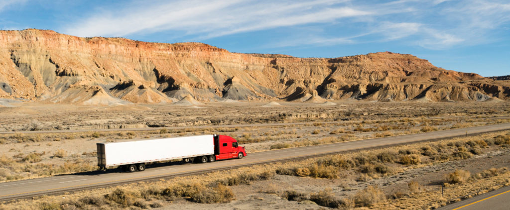 A trucker navigates this Utah highway in his big rig