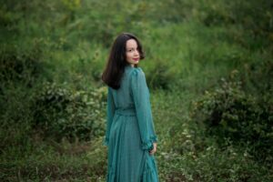 a woman in a blue dress